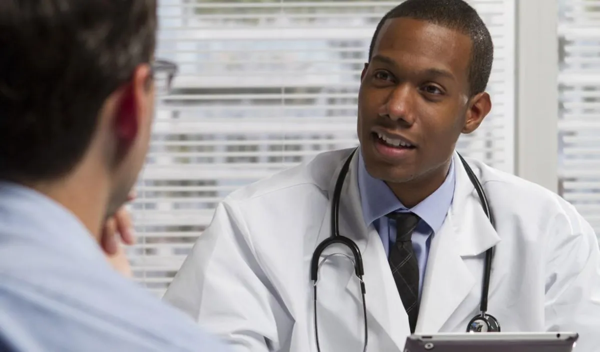 Doctor speaking to patient