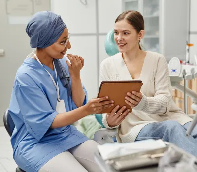 Nurse talking to patient